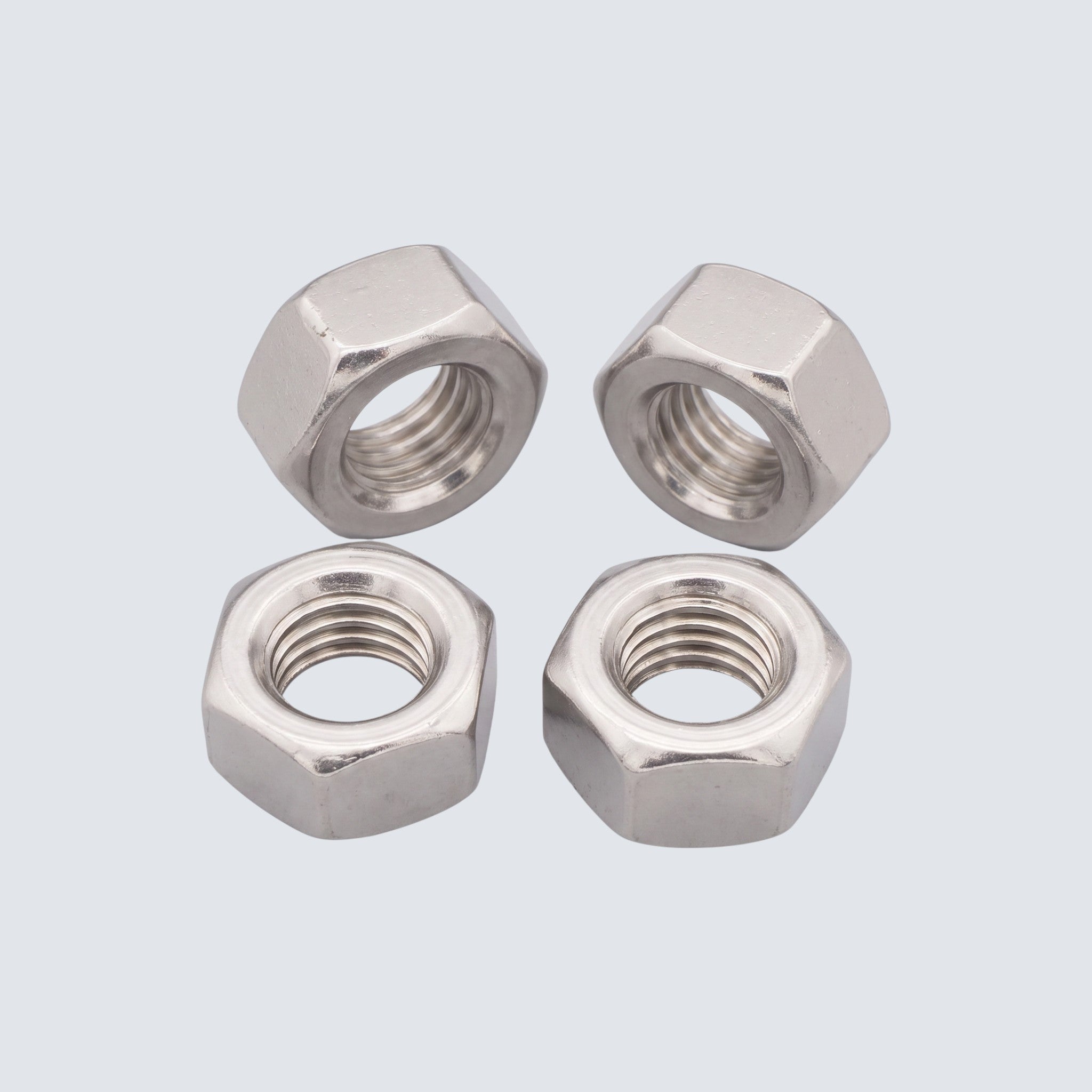 Rostfri.nu A2 stainless steel DIN 934 hex nuts with a metallic finish, suitable for indoor and outdoor construction.