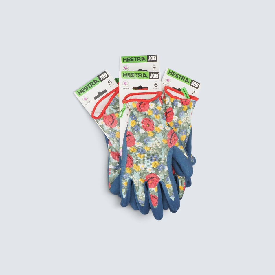 Rostfri.nu Hestra Job garden gloves with floral pattern, blue latex coating, and seamless polyester construction.